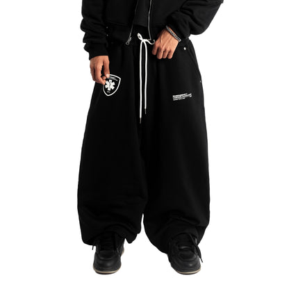 BLACK TRAUMA UNIT SWEATS